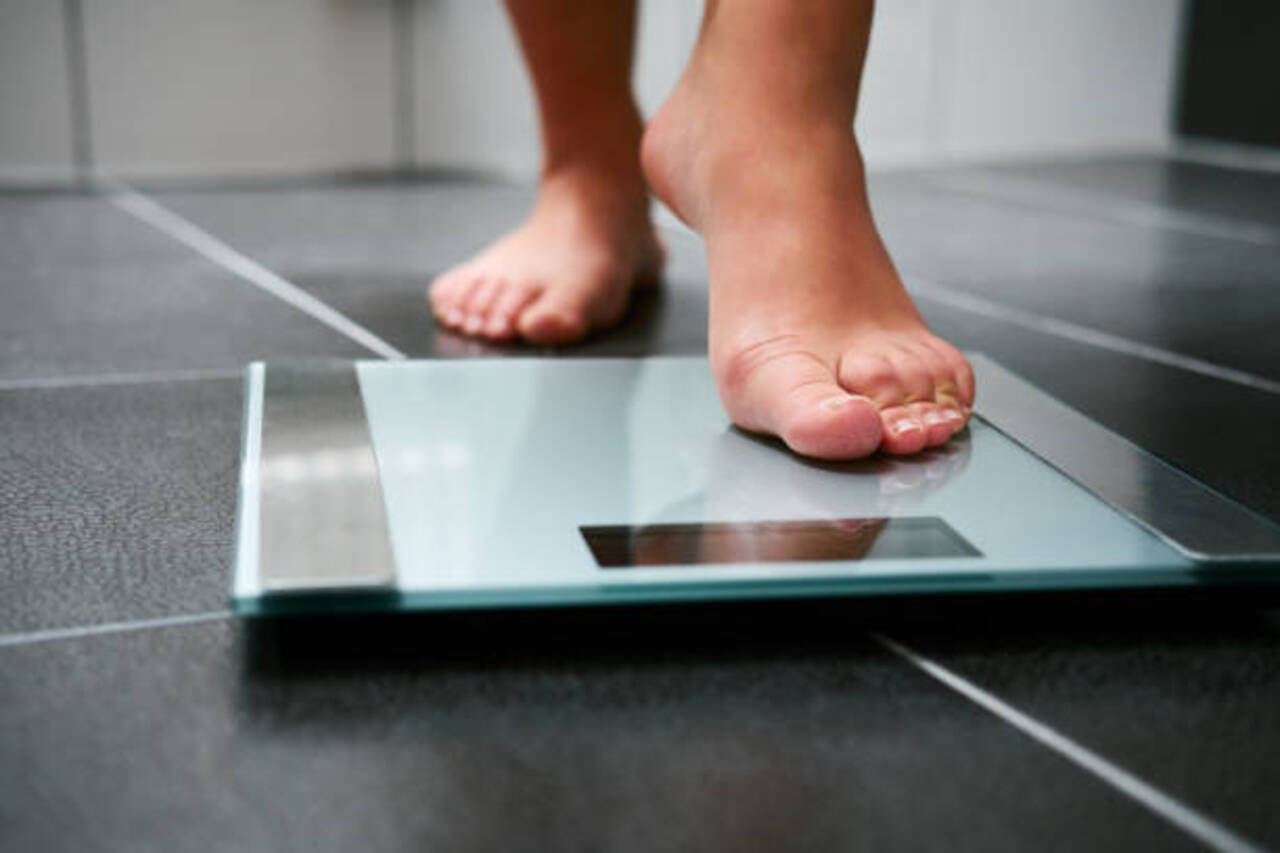 Stepping on a scale for weight management and sleep health.