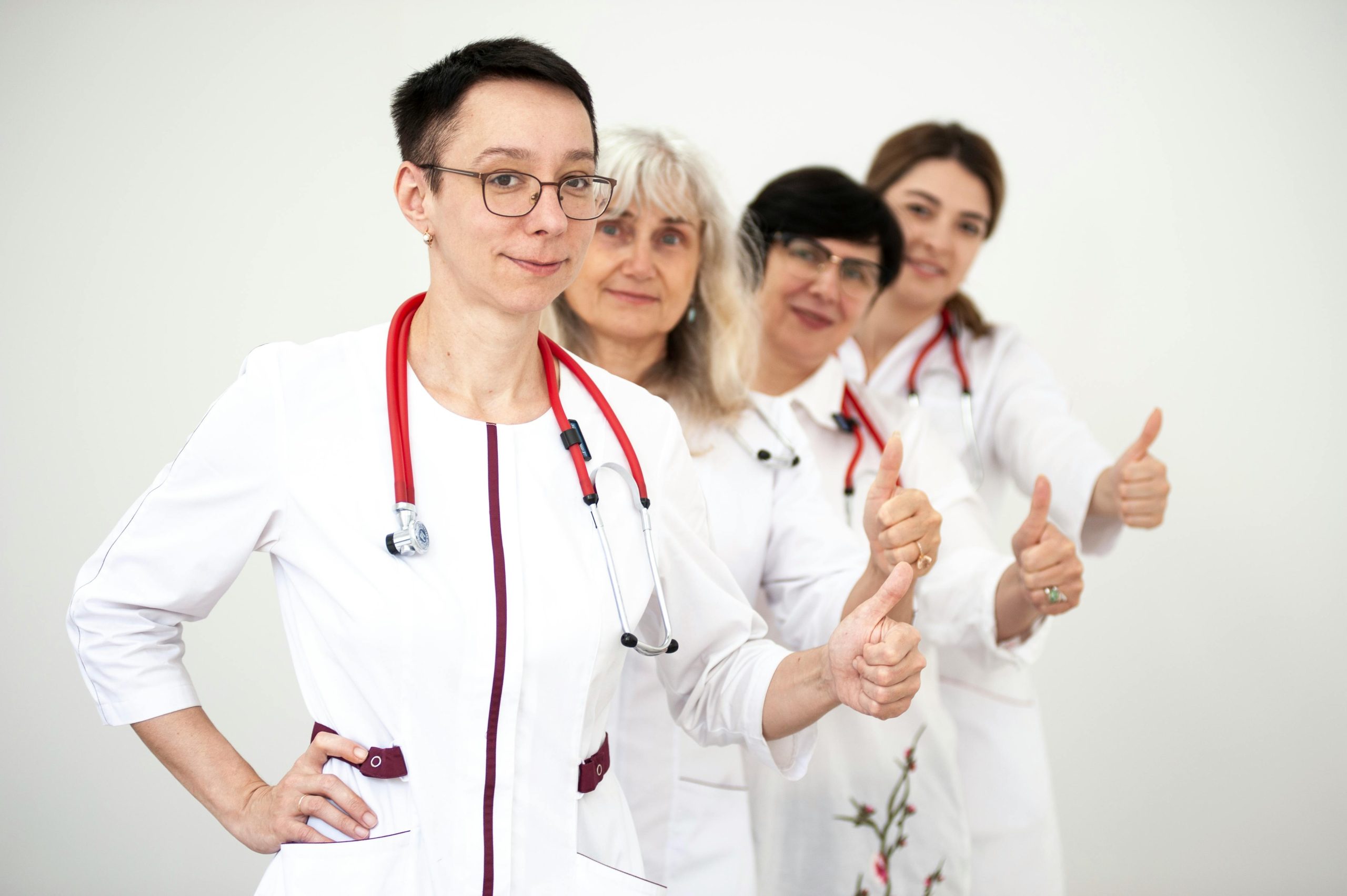 Sleep specialists giving a thumbs-up for top patient care.