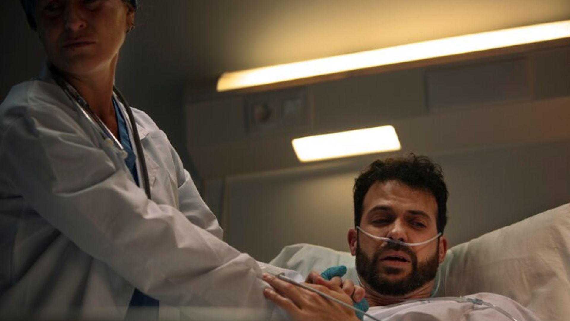 Patient receiving care from a doctor, addressing health concerns.