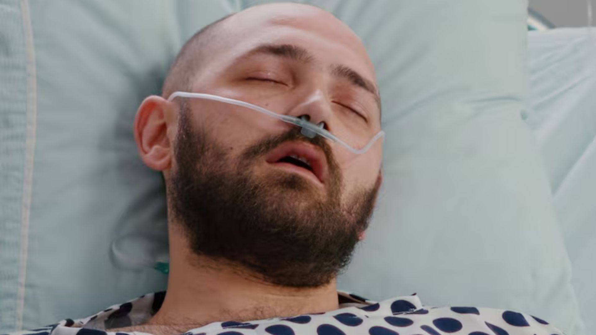 Man using CPAP therapy for obstructive sleep apnea treatment.