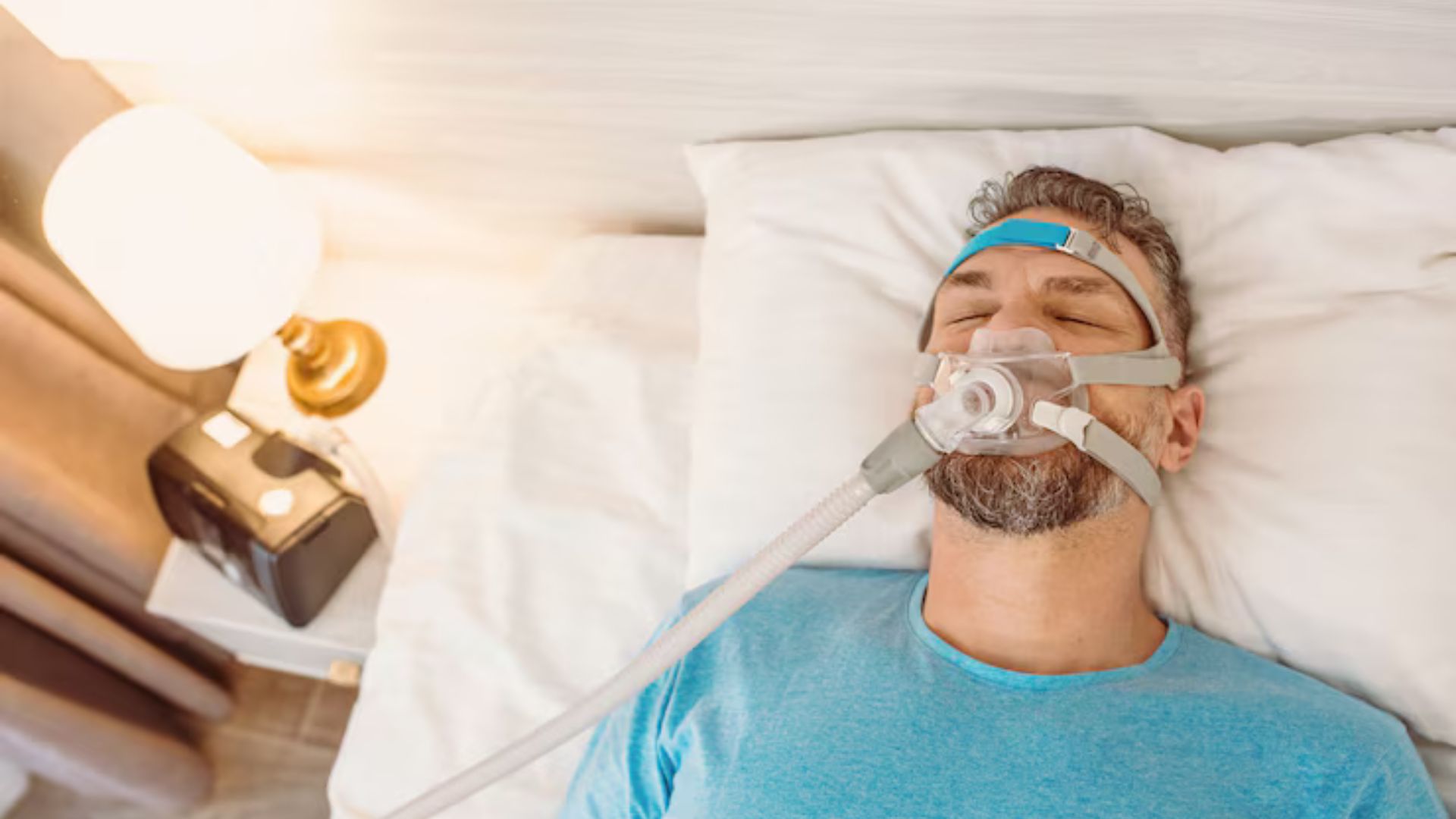 Man using CPAP therapy for better sleep quality.