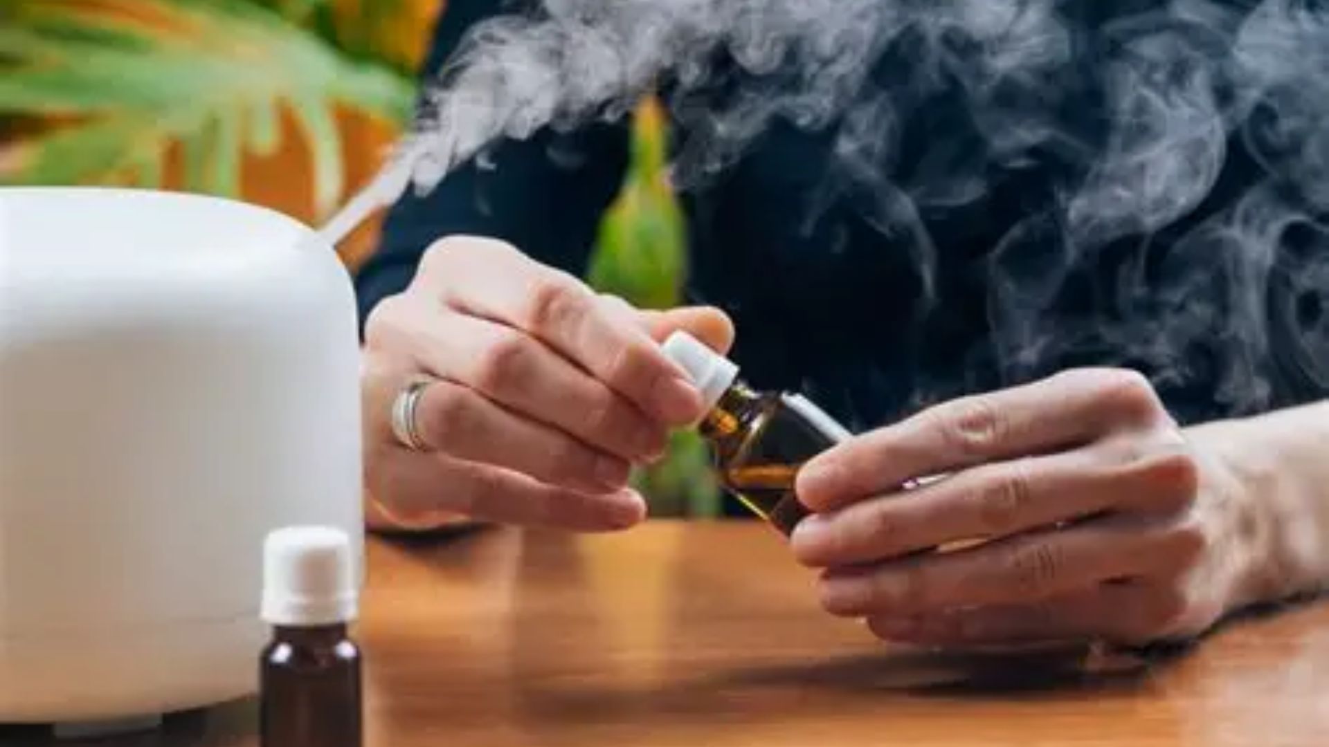 Using essential oils diffuser to create calming sleep air